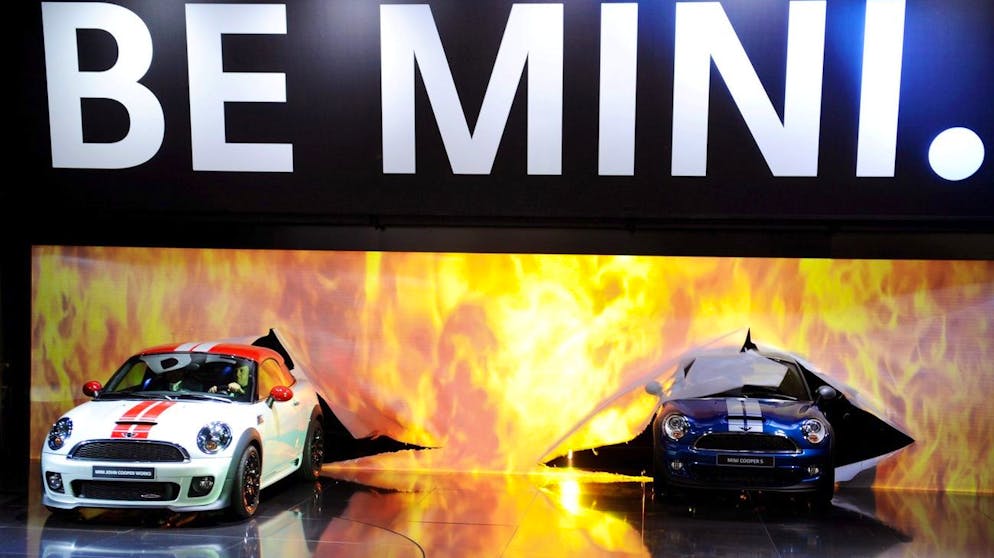 epa02914544 Car manufacturer Mini presents the new Mini Coupe during a press conference at the International Motor Show IAA in Frankfurt am Main, Germany, 13 September 2011. From 15 to 25 September 2011 exhibitors from all over the world will present new trends of the automotive industry, headed by electronic mobility and hybrid vehicles. EPA/ARNE DEDERT