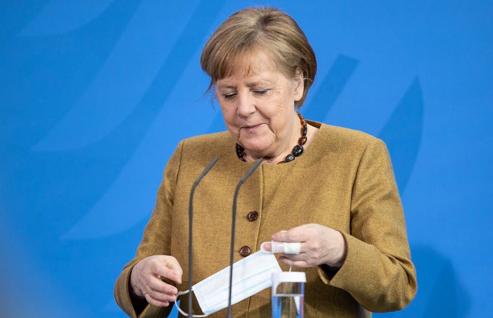 epa09132441 German Chancellor Angela Merkel gives a statement after a cabinet meeting in Berlin, 13 April 2021. The German cabinet in its 137th session agreed on a change of the German Infection Protection law amid the coronavirus pandemic that would allow the implementation of countrywide counter-measures in case of a certain rate of infections. Both chambers of the German parliament still have to approve the amendment. EPA/ANDREAS GORA / POOL