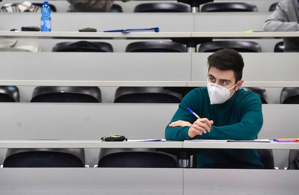 epa09048777 A student of the Faculty of Economics of the University of Genoa, takes a lecture in attendance, in Genoa, Italy, 03 March 2021. High schools across Italy reopen on 01 February with presence percentages ranging from 50 to 75 per cent. EPA/LUCA ZENNARO
