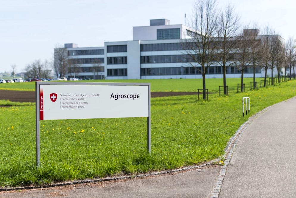 The logos of Agroscope and the Swiss Confederation, pictured on April 7, 2014, in Reckenholz-Taenikon, Switzerland. In Switzerland, field trials with genetically modified plants are held. For this purpose, on behalf of the Swiss government, Agroscope has set up fenced and guarded fields, a so-called