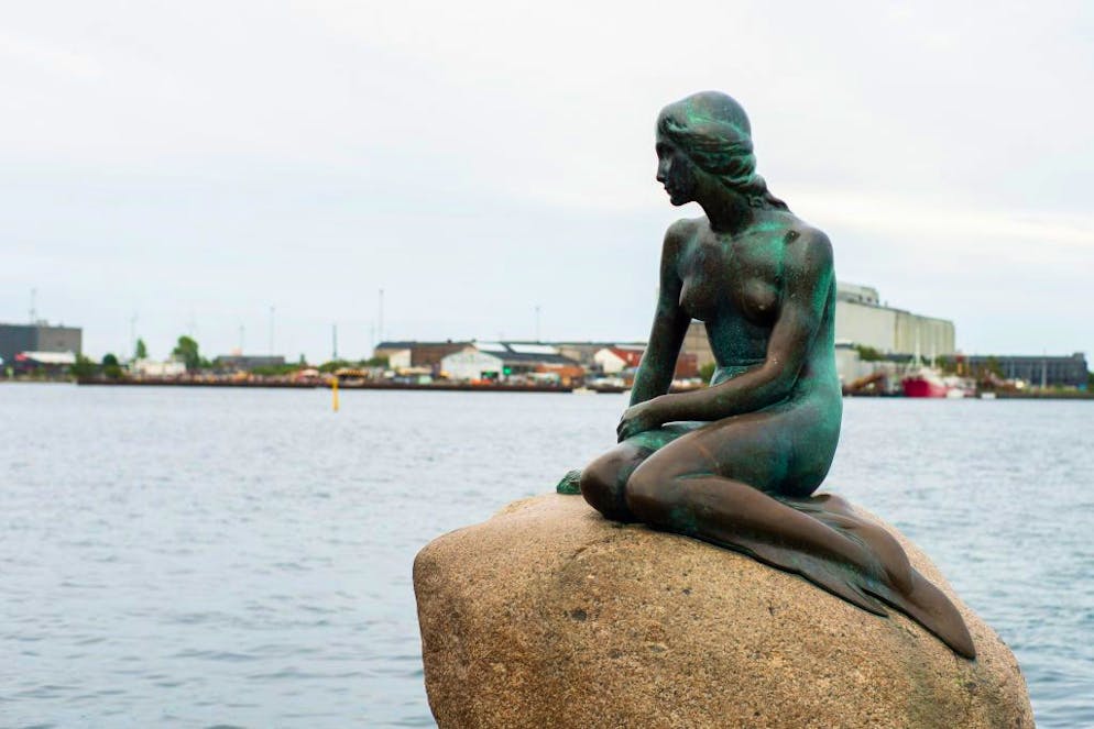 The Little Mermaid is a sculpture of a bronze mermaid, made by the Danish sculptor Edvard Eriksen, is located in the bay of the Port of Copenhagen, on some rocks that go into the sea. It is currently the most prominent symbol of the city. Copenhagen August 12, 2019 Denmark (Photo by Oscar Gonzalez/NurPhoto via Getty Images)