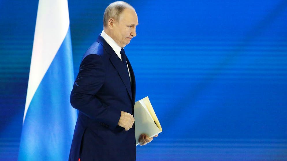 Russian President Vladimir Putin enters the hall for his annual state of the nation address in Manezh, Moscow, Russia, Wednesday, April 21, 2021. Putin's state-of-the-nation speech comes amid a new surge in tensions with the West over a Russian troop buildup near the border with Ukraine and a hunger strike by jailed Russian opposition leader Alexei Navalny protesting a lack of adequate medical treatment in prison. (AP Photo/Alexander Zemlianichenko, Pool)