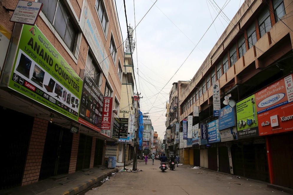 epa09152884 A general view showing the electronics and hardware shops after they were shut down at silver jubilee park as part of the partial lockdown imposed in the wake of rising COVID19 cases in Bangalore, India, 22 April 2021. The Karnataka government is contemplating a partial lockdown of the city in the wake of rising Covid-19 cases, extending the night curfew and imposed a weekend curfew which include closure of cinema halls, bars and pubs, gyms and colleges. India recorded a massive surge of 314,835 fresh Covid-19 cases the highest single-day spike in COVID-19 infections. EPA/JAGADEESH NV