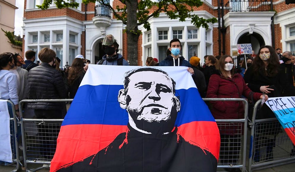 epa09150804 Supporters of Russian opposition leader Alexei Navalny attend a demonstration organized by the group 'Art of Rebel' outside the Russian embassy in London, Britain, 21 April 2021. Rallies supporting Navalny take place in several cities in Europe. Russian opposition leader Alexei Navalny has been transferred from the penal colony No. 2 (IK-2) in Pokrov, Vladimir region, to the regional prison hospital in IK-3 in Vladimir for receiving vitamin therapy. The decision was taken amid Navalny's hunger strike and announced by his team members fearing for his life. EPA/FACUNDO ARRIZABALAGA