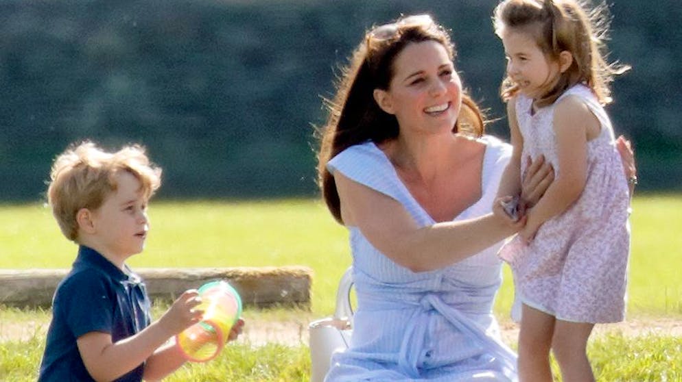 GLOUCESTER, UNITED KINGDOM - JUNE 10: (EMBARGOED FOR PUBLICATION IN UK NEWSPAPERS UNTIL 24 HOURS AFTER CREATE DATE AND TIME) Prince George of Cambridge, Catherine, Duchess of Cambridge and Princess Charlotte of Cambridge attend the Maserati Royal Charity Polo Trophy at the Beaufort Polo Club on June 10, 2018 in Gloucester, England. (Photo by Max Mumby/Indigo/Getty Images)