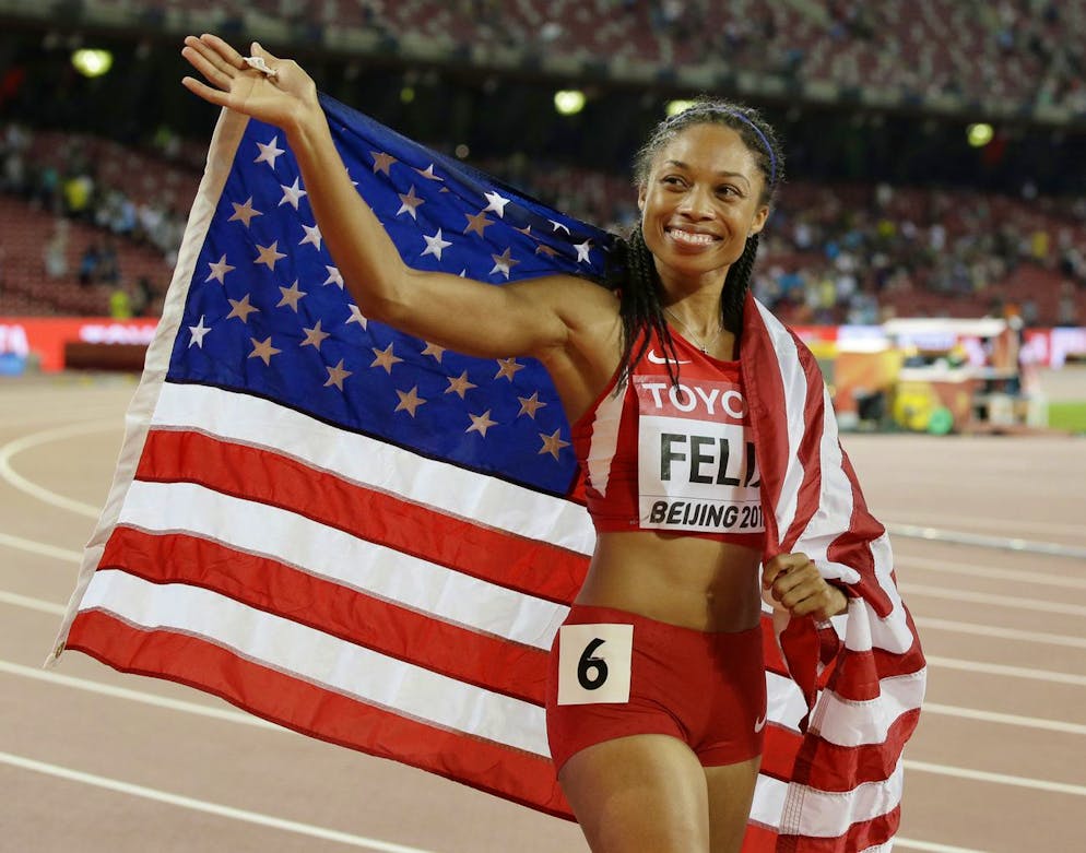 United States' Allyson Felix celebrates after winning the women's 400m final at the World Athletics Championships at the Bird's Nest stadium in Beijing, Thursday, Aug. 27, 2015. (AP Photo/Kin Cheung)