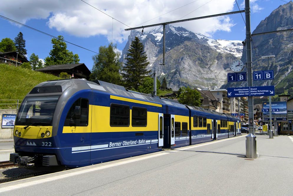 A train of the Jungfraubahn is about to depart from Grindelwald train station to Interlaken, at Grindelwald, Switzerland, Tuesday, June 2, 2020. (KEYSTONE/Anthony Anex)