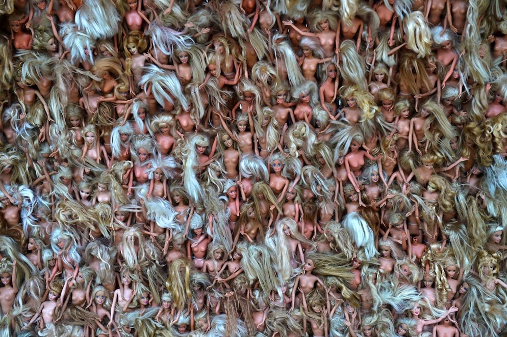 epa04988436 A close up detail of 'Wave 2' by artist Annette Thas, on display as part of the annual Sculpture by the Sea along the Bondi Beach to Bronte Beach walk in Sydney, Australia, 22 October 2015. The exhibition runs from 22 October to 08 November 2015. 'Wave 2' is made from 5,000 barbie dolls. EPA/DEAN LEWINS AUSTRALIA AND NEW ZEALAND OUT