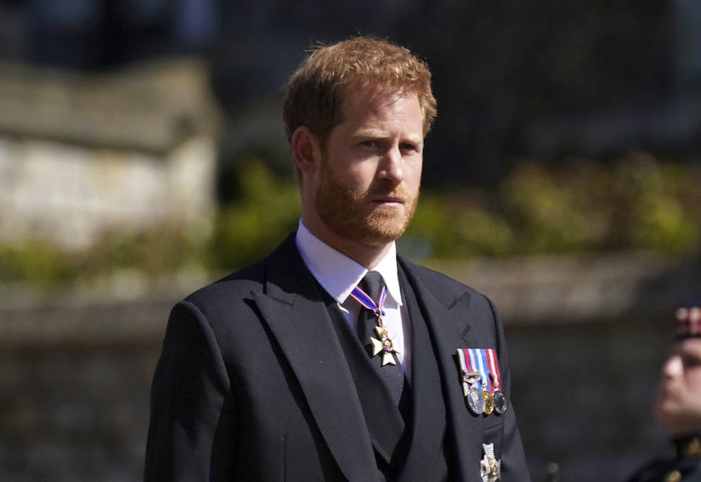 Prince Harry walks in the procession, ahead of Britain Prince Philip's funeral at Windsor Castle, Windsor, England, Saturday April 17, 2021. Prince Philip died April 9 at the age of 99 after 73 years of marriage to Britain's Queen Elizabeth II. (Victoria Jones/Pool via AP)