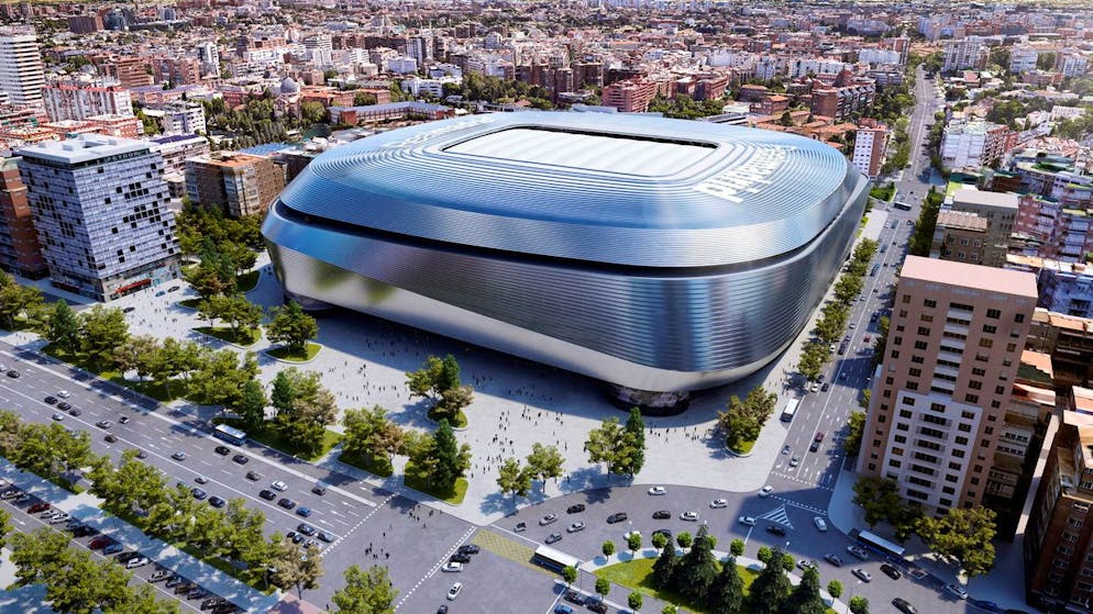 epa07485178 A handout photo made available by Real Madrid and made available on 04 April 2019 shows a rendering of the future Santiago Bernabeu Stadium after renovation works announced by the club, in Madrid, Spain. The planned new stadium will feature a wrap-around facade consisting of strips of steel and stripes that can be lit up, a retractable roof that will ensure that all of the seating areas are covered, an impressive 360° scoreboard, a luxury hotel as well as restaurant and entertainment areas. The construction works of the new stadium will be carried out by GMP Arquitectos and L35 Ribas and will kick off this summer, according to Real Madrid sources. EPA/- HANDOUT EDITORIAL USE ONLY/NO SALES