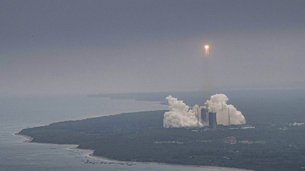 In this photo released by China's Xinhua News Agency, a Long March 5B rocket carrying a module for a Chinese space station lifts off from the Wenchang Spacecraft Launch Site in Wenchang in southern China's Hainan Province, Thursday, April 29, 2021. China has launched the core module on Thursday for its first permanent space station that will host astronauts long-term. (Pu Xiaoxu/Xinhua via AP)