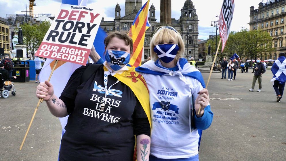 Scottish independence supporters attend a rally in Glasgow, Scotland, Saturday, May 1, 2021. Scotland holds an election Thursday that could hasten the breakup of the United Kingdom. The pro-independence Scottish National Party is leading in the polls and a big victory will give it the the moral right and the political momentum to hold a referendum on whether Scotland should end its three-century union with England. But many voters, even if they support independence, are cautious. (AP Photo/Renee Graham)