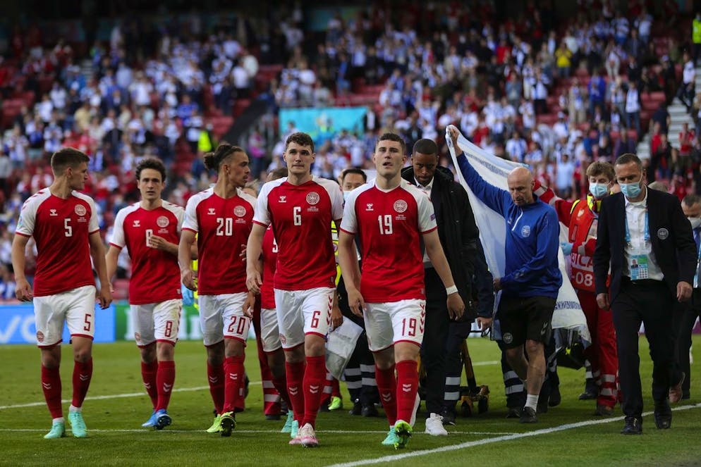 Paramedics using a stretcher to take out of the pitch Denmark's Christian Eriksen after he collapsed during the Euro 2020 soccer championship group B match between Denmark and Finland at Parken stadium in Copenhagen, Denmark, Saturday, June 12, 2021. (Friedemann Vogel/Pool via AP)