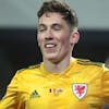 epa09094659 Harry Wilson of Wales celebrates after scoring the 0-1 goal during the FIFA World Cup 2022 qualification match between Belgium and Wales in Leuven, Belgium, 24 March 2021. EPA/STEPHANIE LECOCQ