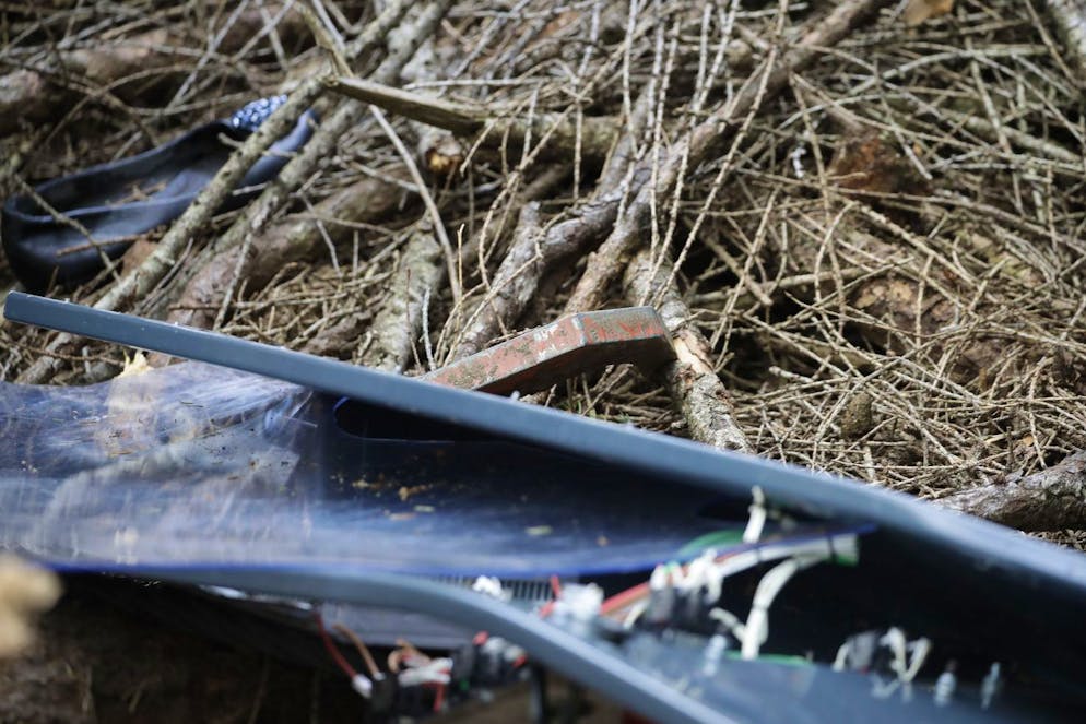 The clamp that was supposedly placed on the second emergency brake was eventually found as search for evidence continues in the wreckage of a cable car after it collapsed near the summit of the Stresa-Mottarone line in the Piedmont region, northern Italy, Wednesday, May 26, 202. Police have made three arrests in the cable car disaster that killed 14 people after an investigation showed a clamp, placed on the brake as a patchwork repair effort, prevented the brake from engaging after the lead cable snapped. (AP Photo/Luca Bruno)