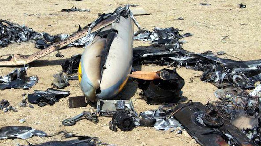 epa04367899 A handout picture made available by the official website of the Iranian Revolutionary Guard Corps (IRGC) on 25 August 2014 is said to show parts of the shot-down Israeli drone at an undisclosed location in Iran. Iran's Revolutionary Guards said on 24 August its forces had shot down an Israeli spy drone that crossed into its airspace near the nuclear facility in Natanz. The Revolutionary Guards said the unmanned aerial vehicle was intercepted by a surface-to-air missile before it could approach the facility in central Iran. EPA/IRGC OFFICIAL WEBSITE/HANDOUT HANDOUT EDITORIAL USE ONLY/NO SALES