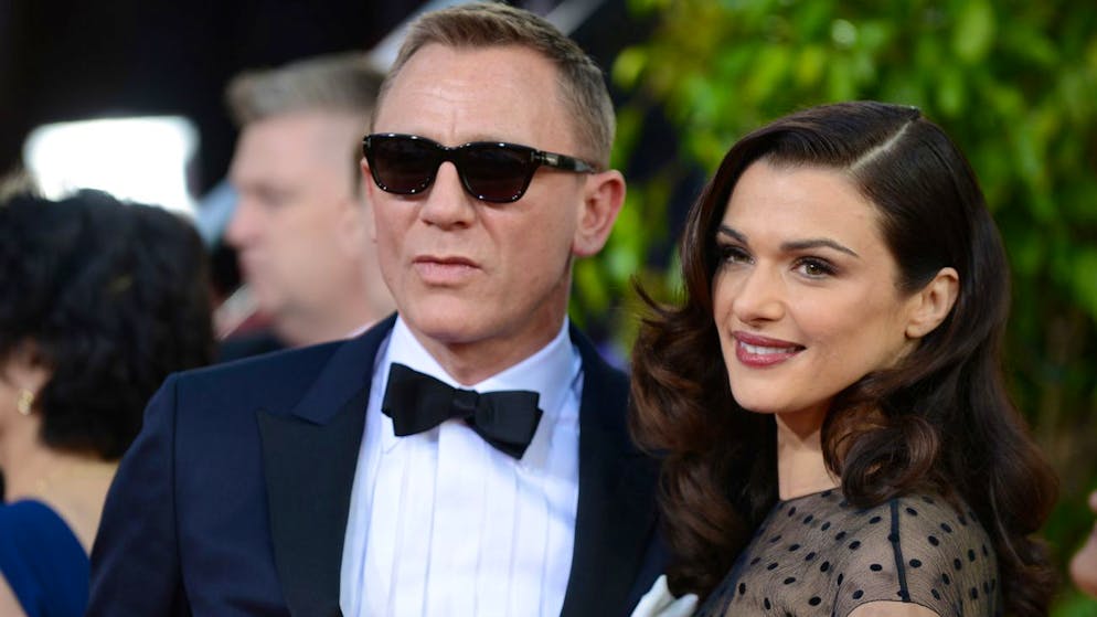 Actors Daniel Craig, left, and Rachel Weisz arrive at the 70th Annual Golden Globe Awards at the Beverly Hilton Hotel on Sunday Jan. 13, 2013, in Beverly Hills, Calif. (Photo by Jordan Strauss/Invision/AP)