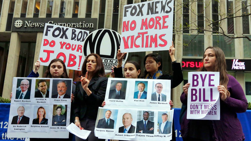 Sonia Ossorio, second left, president of the National Organization for Women New York, speaks outside the News Corporation headquarters, in New York, Thursday, April 20, 2017, a day after Fox News Channel's Bill O'Reilly was fired. The firing came on the heels of a New York Times report on April 1, that five women had been paid a total of $13 million to keep quiet about their disturbing encounters with O'Reilly. (AP Photo/Richard Drew)