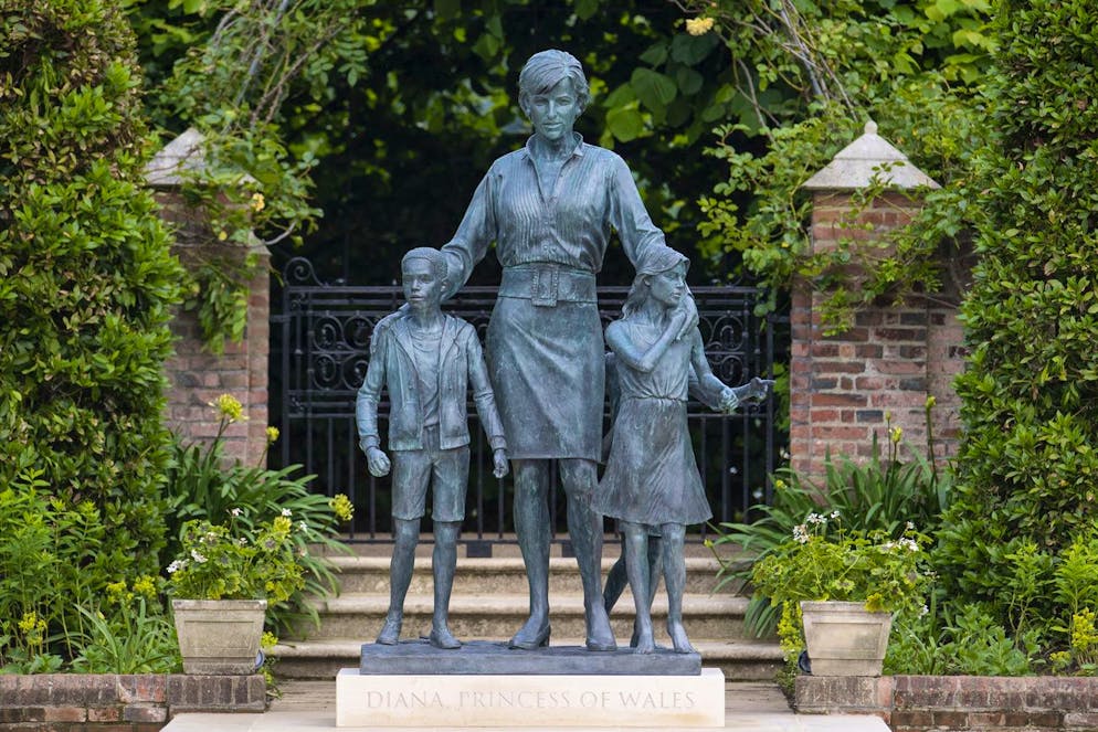 A view of a statue commissioned by Britain's Prince William and Prince Harry of their mother Princess Diana, on what woud have been her 60th birthday, in the Sunken Garden at Kensington Palace, London, Thursday July 1, 2021. (Dominic Lipinski /Pool Photo via AP)