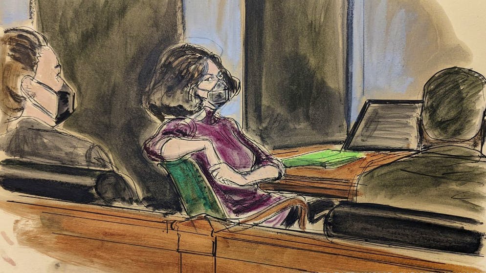 In this courtroom sketch, Ghislaine Maxwell, center, sits in the courtroom during a discussion about a note from the jury, during her sex trafficking trial, Wednesday, Dec. 29, 2021, in New York. (AP Photo/Elizabeth Williams)