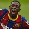 Barcelona's Ousmane Dembele celebrates after scoring during a Spanish La Liga soccer match between Sevilla and Barcelona at the Ramon Sanchez-Pizjuan stadium in Seville, Spain, Saturday Feb. 27, 2021. (AP Photo/Angel Fernandez)