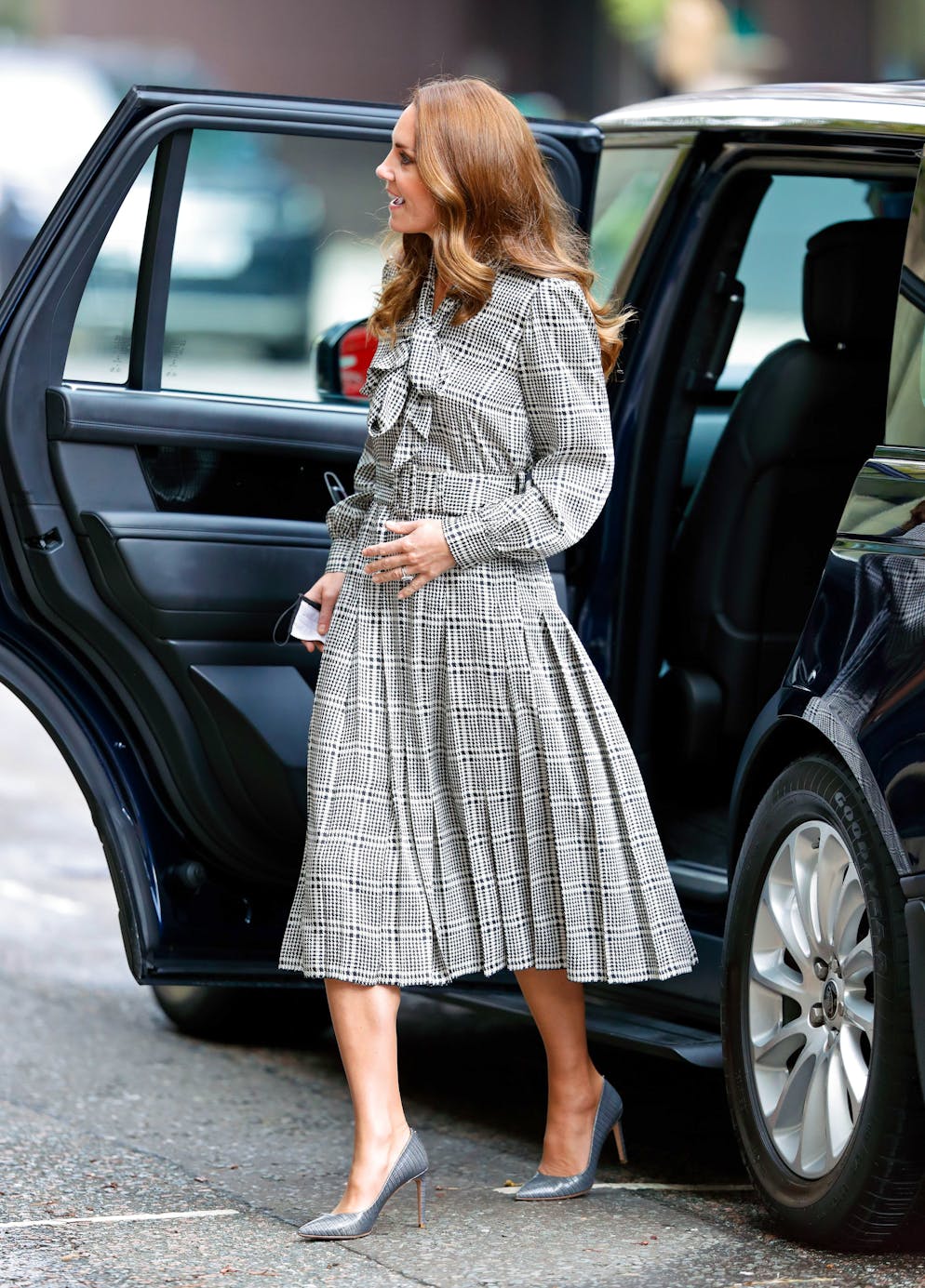 LONDON, UNITED KINGDOM - OCTOBER 05: (EMBARGOED FOR PUBLICATION IN UK NEWSPAPERS UNTIL 24 HOURS AFTER CREATE DATE AND TIME) Catherine, Duchess of Cambridge gets out of her Range Rover car as she arrives for a visit to University College London's Centre for Longitudinal Studies to meet with leading early years researchers and learn more about their new holistic study into early years on October 5, 2021 in London, England. The new study 'The Children of the 2020s' is a nationally representative birth cohort study launching in England, which will track the holistic development of children from the age of nine months to five years. (Photo by Max Mumby/Indigo/Getty Images)