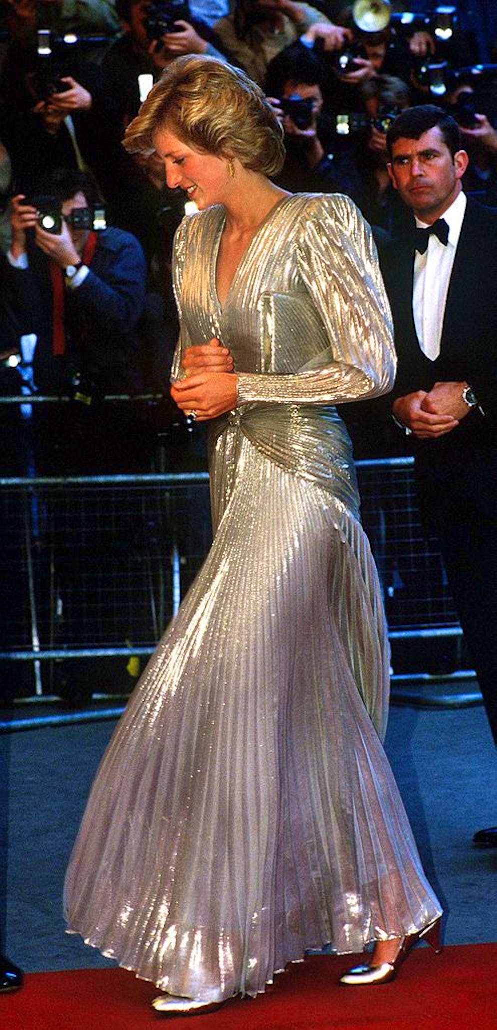 Princess Diana (1961 - 1997) arrives for the London premiere of the James Bond film 'A View To A Kill' at the Empire, Leicester Square, July 1985. She is wearing a gold lame evening gown by Bruce Oldfield. (Photo by Jayne Fincher/Princess Diana Archive/Getty Images)
