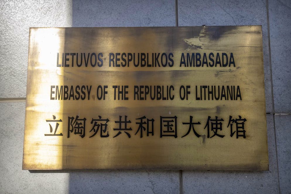 The nameplate for the Lithuanian Embassy is seen on the outside of the embassy building in Beijing, Thursday, Dec. 16, 2021. Lithuania said Wednesday, Dec. 15, 2021, that it has closed its embassy in Beijing and pulled its last diplomat out of the Chinese capital, a move that came amid a spat over the European Union nation allowing Taiwan to open a representative office in its capital, Vilnius. (AP Photo/Mark Schiefelbein)