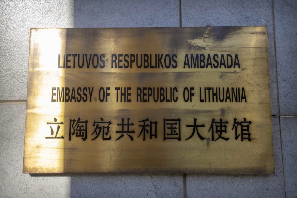 The nameplate for the Lithuanian Embassy is seen on the outside of the embassy building in Beijing, Thursday, Dec. 16, 2021. Lithuania said Wednesday, Dec. 15, 2021, that it has closed its embassy in Beijing and pulled its last diplomat out of the Chinese capital, a move that came amid a spat over the European Union nation allowing Taiwan to open a representative office in its capital, Vilnius. (AP Photo/Mark Schiefelbein)