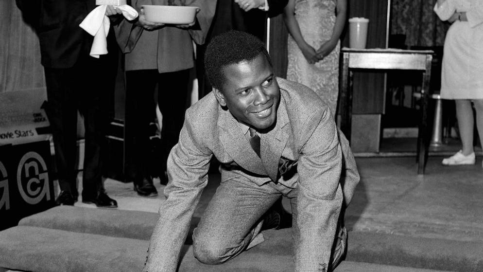 Sidney Poitier a été le premier acteur noir à recevoir l'Oscar du meilleur acteur pour son rôle dans "Lillies of the Field" ("Le lys des champs") de Ralph Nelson (archives).