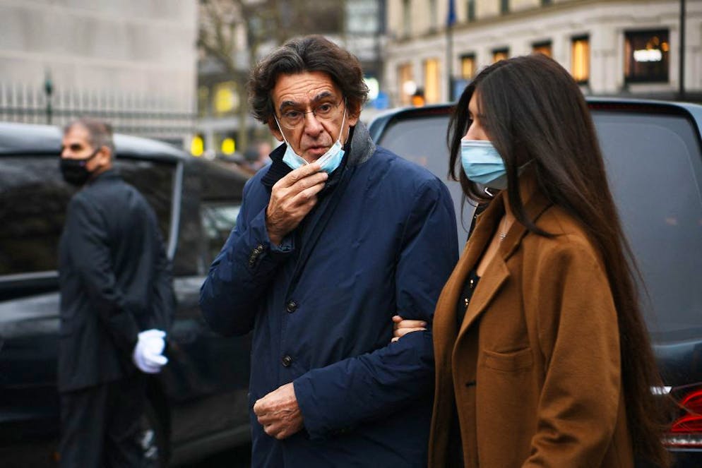 French philosopher Luc Ferry arrives for the funeral ceremony of French TV hosts and science writers, twin brothers Igor and Grichka Bogdanoff, at the Madeleine church in Paris, on January 10, 2022. - The twins who became the faces of a famed 1980s science TV programme before winning notoriety for their cosmetic surgery, died within a week from each other on December 28, 2021 (Grichka) and January 3, 2022 (Igor), aged 72, from Covid-19, after refusing the vaccination. (Photo by Christophe ARCHAMBAULT / AFP) (Photo by CHRISTOPHE ARCHAMBAULT/AFP via Getty Images)