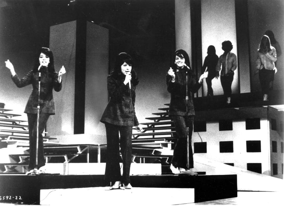 The Ronettes, Ronnie Bennett, lead singer, Estelle Bennet, left, and Nedra Talley, perform on May 26, 1966. The group was selected to be inducted into the Rock and Roll Hall of Fame on Monday, Jan. 8,2007, along with Van Halen, Grandmaster Flash and the Furious Five, R.E.M. and Patti Smith. (KEYSTONE/AP Photo/Str) === ===