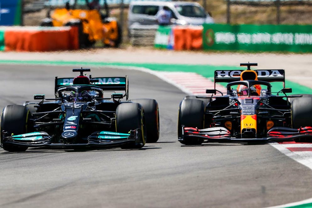 epa09174305 British Formula One driver Lewis Hamilton (L) of Mercedes-AMG Petronas is on his way to win the 2021 Formula One Grand Prix of Portugal at the Autodromo Internacional do Algarve near Portimao, Portugal, 02 May 2021. Hamilton won ahead of second placed Dutch driver Max Verstappen (R) of Red Bull Racing. EPA/JOSE SENA GOULAO