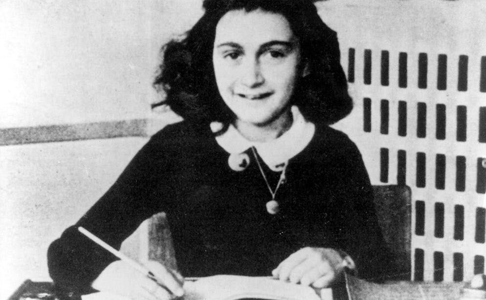 This is an undated photo of Anne Frank, the young Jewish girl who, with her family, hid from the Nazis in Amsterdam, Netherlands, during World War II. Though today she is known around the world, she was just one of more than 100,000 Jews deported from the Netherlands to Nazi camps for death or forced labor. Her name appears only once among the 50 million pages in the world's largest storehouse of documents on victims of Nazism, the Red Cross's International Tracing Service. (AP Photo)