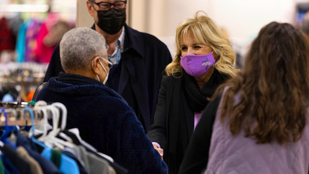 First lady Jill Biden greets a shopper at the FEMA State Disaster Recovery Center in Bowling Green, Ky., Friday, Jan. 14, 2022. The Bowling Green neighborhood was one of several areas hard hit by Dec. 10 tornadoes that tore through the western part of Kentucky. (AP Photo/Michael Clubb)