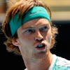 Russia's Andrey Rublev celebrates after winning his match against Italy's Gianluca Mager during their men's singles match on day two of the Australian Open tennis tournament in Melbourne on January 18, 2022. - -- IMAGE RESTRICTED TO EDITORIAL USE - STRICTLY NO COMMERCIAL USE -- (Photo by Brandon MALONE / AFP) / -- IMAGE RESTRICTED TO EDITORIAL USE - STRICTLY NO COMMERCIAL USE -- (Photo by BRANDON MALONE/AFP via Getty Images)