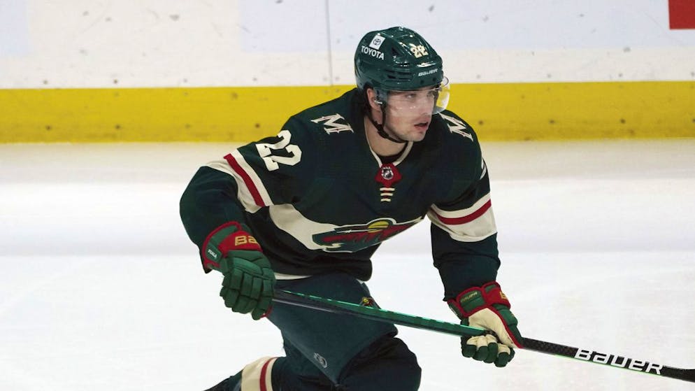 Minnesota Wild's Kevin Fiala (22) skates against the Chicago Blackhawks in an NHL hockey game, Saturday, Jan. 22, 2022, in St. Paul, Minn. (AP Photo/Jim Mone)