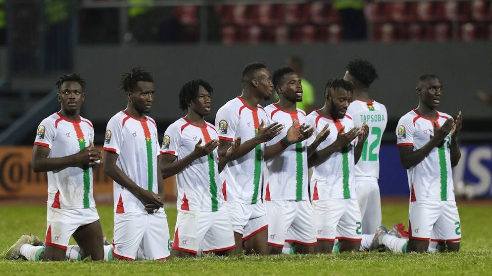 Burkina Faso's players look on during a penalty shootout of the African Cup of Nations 2022 round of 16 match between Burkina Faso and Gabon at Omnisport Stadium in Limbe, Cameroon, Sunday, Jan. 23, 2022. Burkina Faso beat Gabon 7-6. (AP Photo/Sunday Alamba)