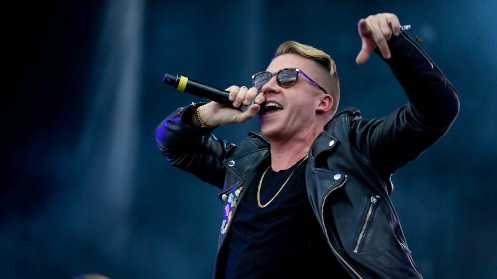 LAS VEGAS, NV - SEPTEMBER 20:  Rapper Macklemore performs onstage during the 2014 iHeartRadio Music Festival Village on September 20, 2014 in Las Vegas, Nevada.  (Photo by Isaac Brekken/Getty Images for iHeartMedia)