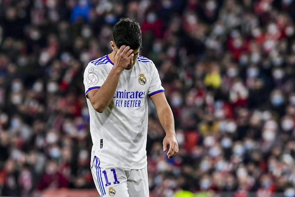 Real Madrid's Marco Asensio reacts during a Spanish Copa del Rey quarter final soccer match between Athletic Bilbao and Real Madrid at the San Mames stadium in Bilbao, Spain, Thursday, Feb. 3, 2022. (AP Photo/Alvaro Barrientos)