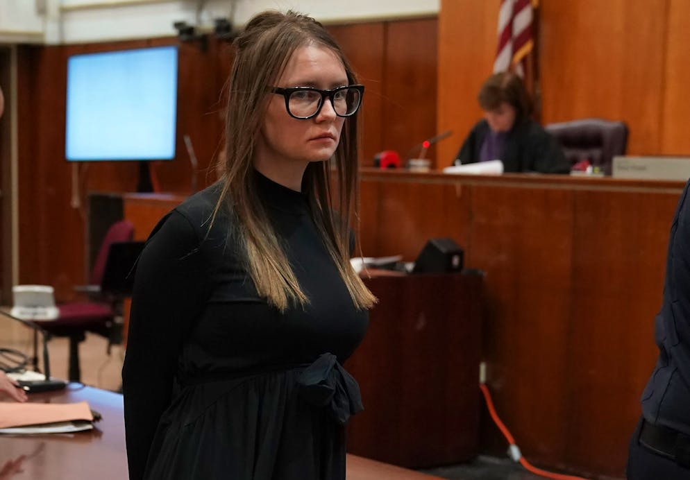 Fake German heiress Anna Sorokin is led away after being sentenced in Manhattan Supreme Court May 9, 2019 following her conviction last month on multiple counts of grand larceny and theft of services, Judge Diane Kiesel is seen to the right. (Photo by TIMOTHY A. CLARY / AFP)        (Photo credit should read TIMOTHY A. CLARY/AFP via Getty Images)