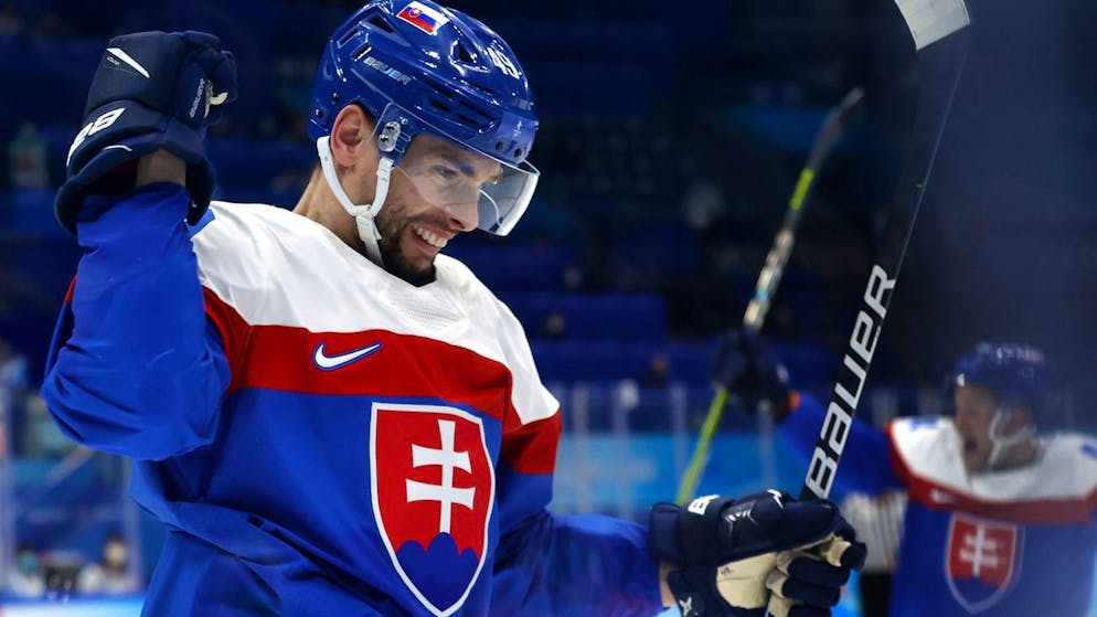 epa09772026 Slovakia's Samuel Takac reacts after scoring for 2-0 against Sweden during the Men's Ice Hockey bronze medal match between Sweden and Slovakia at the Beijing 2022 Olympic Games, Beijing, China, 19 February 2022. EPA/MARK CRISTINO