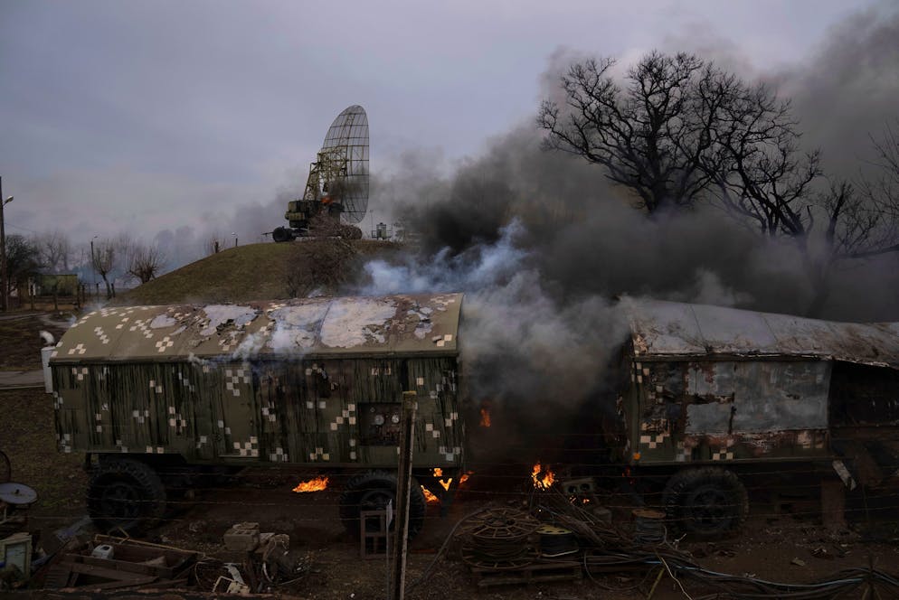 A damaged Ukrainian military facility in the aftermath of Russian shelling outside Mariupol, Ukraine, Thursday, Feb. 24, 2022. Russia has launched a barrage of air and missile strikes on Ukraine early Thursday and Ukrainian officials said that Russian troops have rolled into the country from the north, east and south. (AP Photo/Evgeniy Maloletka)