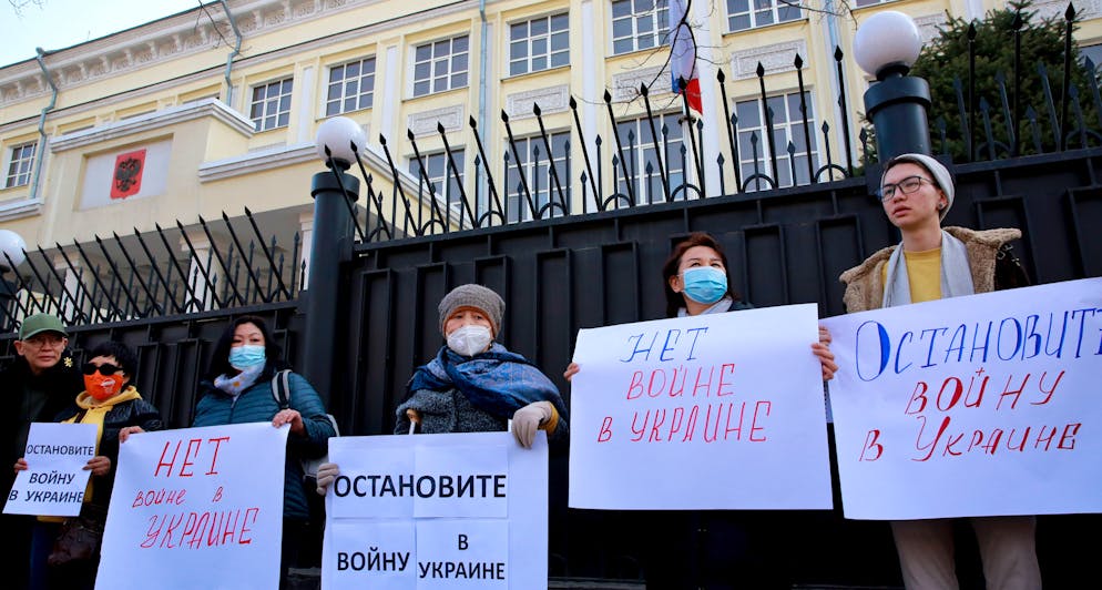 epa09783305 People gather for a rally outside the Russian embassy demanding an end to the war in Ukraine in Bishkek, Kyrgyzstan, 25 February 2022. Russian troops launched a major military operation on Ukraine on 24 February, after weeks of intense diplomacy and the imposition of Western sanctions on Russia aimed at preventing an armed conflict in Ukraine.  EPA / IGOR KOVALENKO