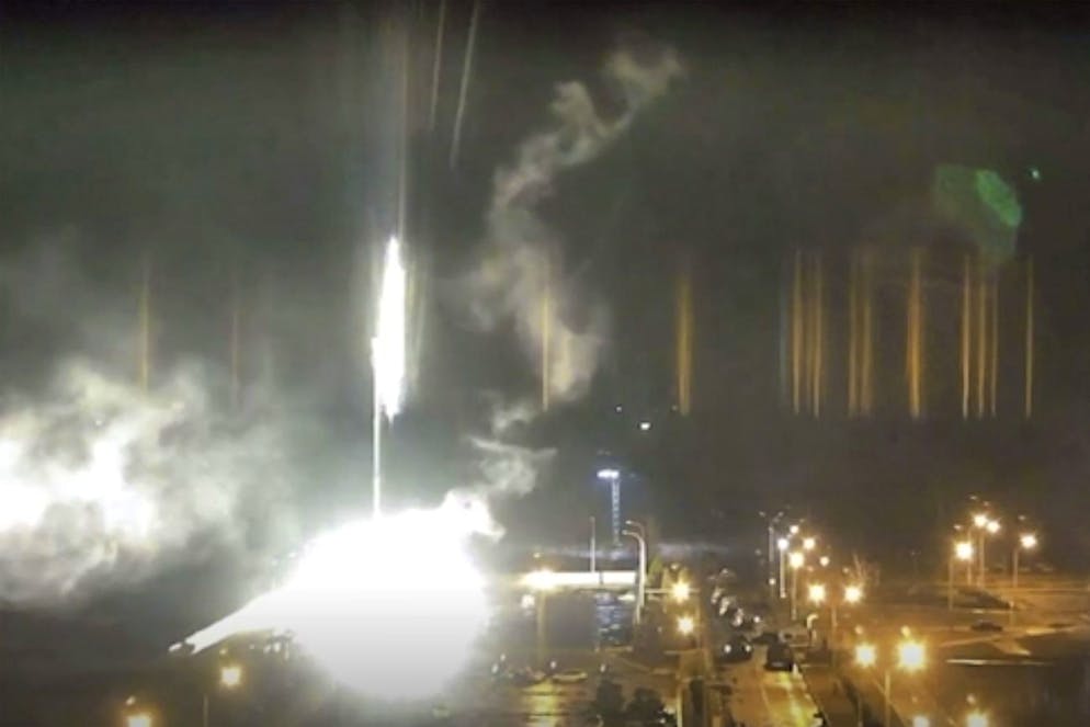 This image made from a video released by Zaporizhzhia nuclear power plant shows bright flaring object landing in grounds of the nuclear plant in Enerhodar, Ukraine Friday, March 4, 2022. Russian forces shelled EuropeâÄ™s largest nuclear plant early Friday, sparking a fire as they pressed their attack on a crucial energy-producing Ukrainian    city and gained ground in their bid to cut off the country from the sea. (Zaporizhzhia nuclear power plant via AP)