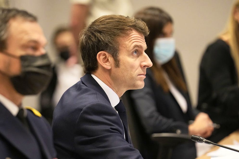 French President Emmanuel Macron attends a video-conference with NATO members at the French Army headquarters, Friday, Feb. 25, 2022 in Paris. NATO leaders met to discuss how far they can go to challenge Russian President Vladimir Putin without engaging Russian forces in direct war. (AP Photo/Michel Euler, Pool)