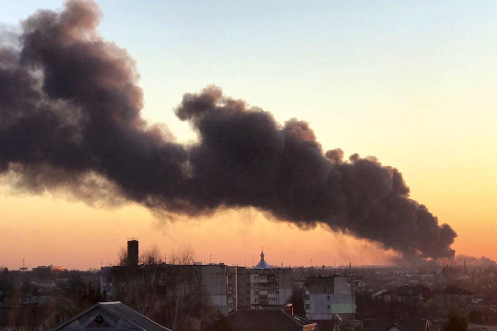 A cloud of smoke raises after an explosion in Lviv, western Ukraine, Friday, March 18, 2022. The mayor of Lviv says missiles struck near the city's airport early Friday. (AP Photo)