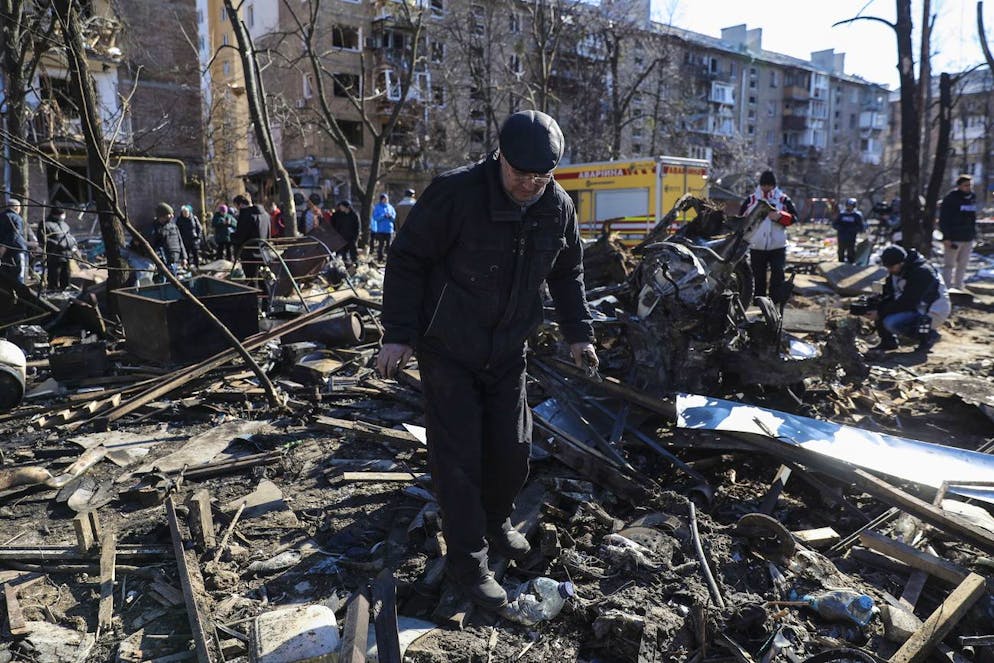 epa09833923 A man search for his belongings in what was his garage destroyed by shelling in Kyiv as Russia's attack on Ukraine continues, Kyiv, Ukraine, 18 March 2022. On 24 February Russian troops had entered Ukrainian territory in what the Russian president declared a 'special military operation', resulting in fighting and destruction in the country, a huge flow of refugees, and multiple sanctions against Russia. EPA/MIGUEL A. LOPES