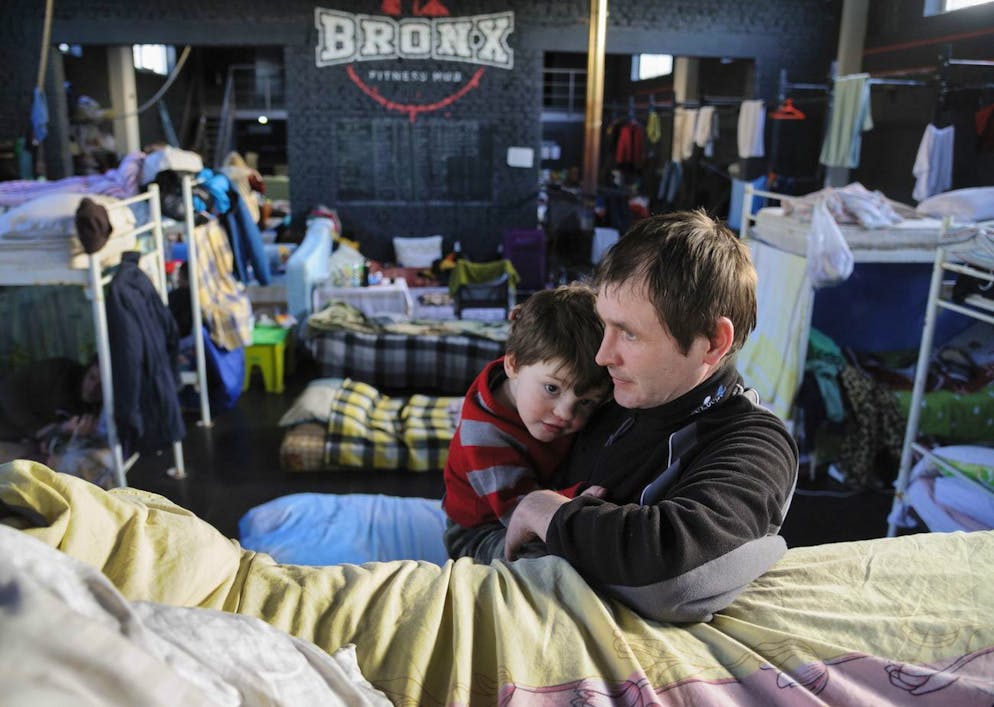 epa09839156 Refugees from different places of Ukraine live in the Bronx fitness hub in Western Ukrainian city of Lviv, Ukraine, 20 March 2022. Russian troops entered Ukraine on 24 February resulting in fighting and destruction in the country, and triggering a series of severe economic sanctions on Russia by Western countries. EPA/MYKOLA TYS