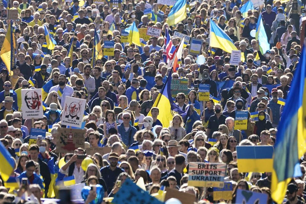 People take part in a solidarity march for Ukraine in London, following the Russian invasion, Saturday March 26, 2022. (Aaron Chown/PA via AP)